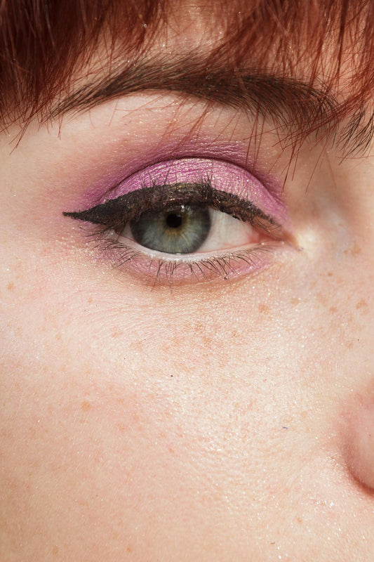 Bottom eyeliner tattoo lower lash line closeup